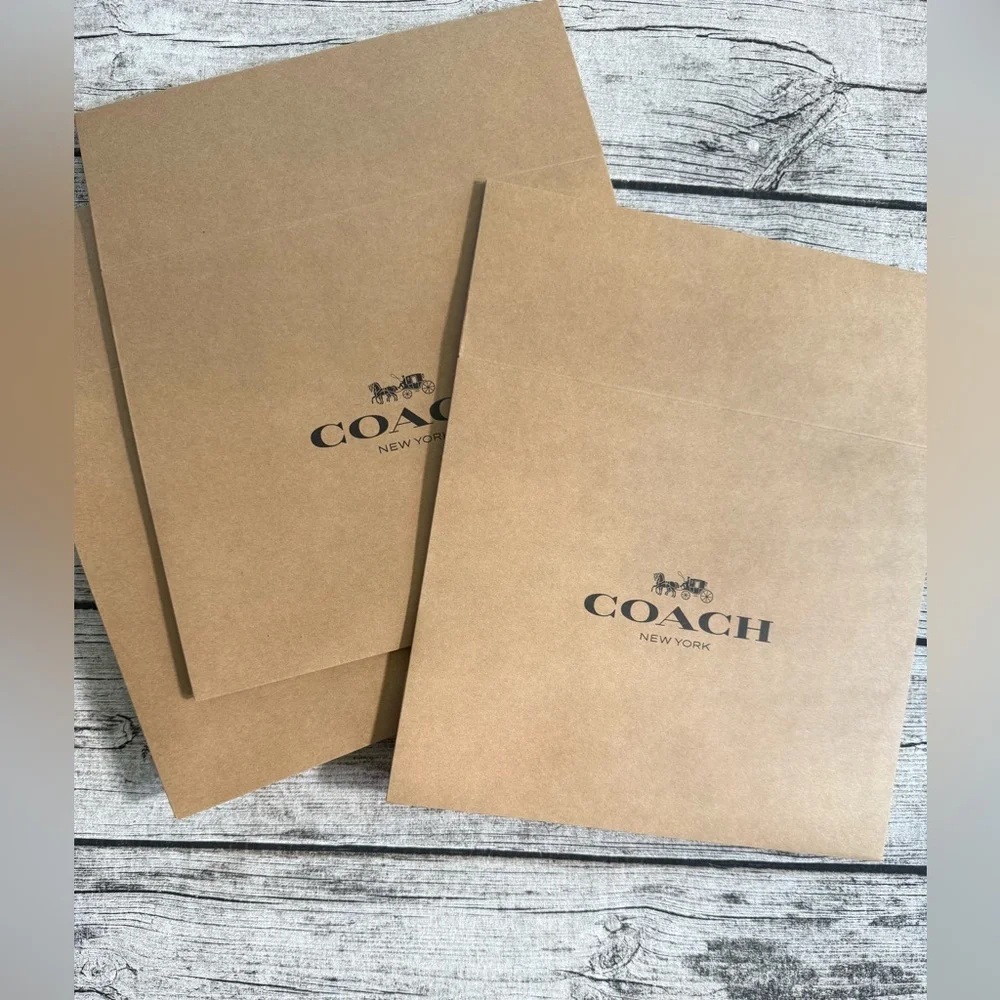 New. Coach large gift box + tissue paper. 10.5 x 12.5 x 4.5 in. Logo printed